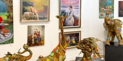 Artwork and sculptures on display in Fascination St. Fine Art gallery.