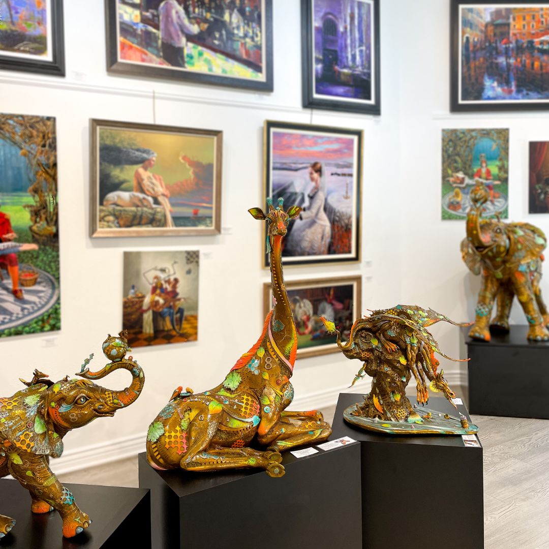 Artwork and sculptures on display in Fascination St. Fine Art gallery.