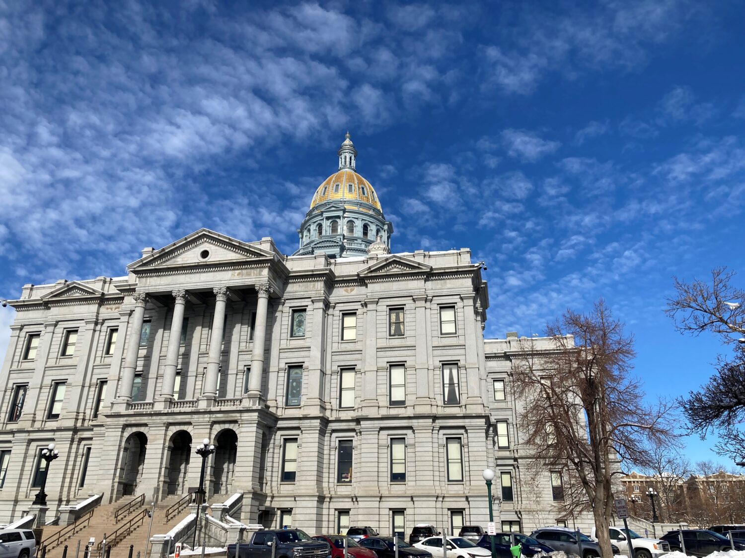 front of Colorado State Capitol building with blue sky